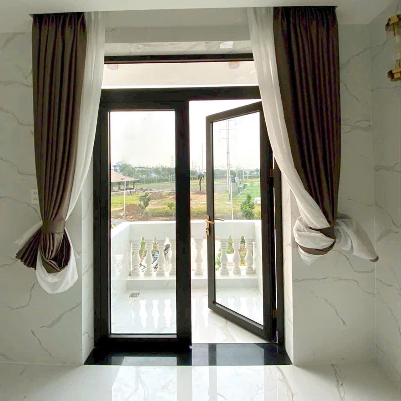 Làm cửa nhôm kính Hà Nội